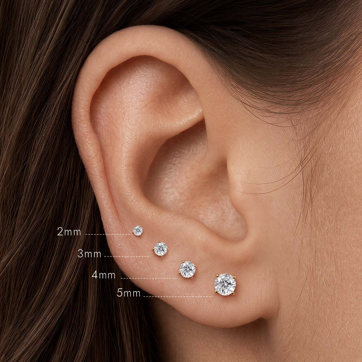 Classic 4-Prong Setting stud sizes 2mm to 5mm compared on the ear